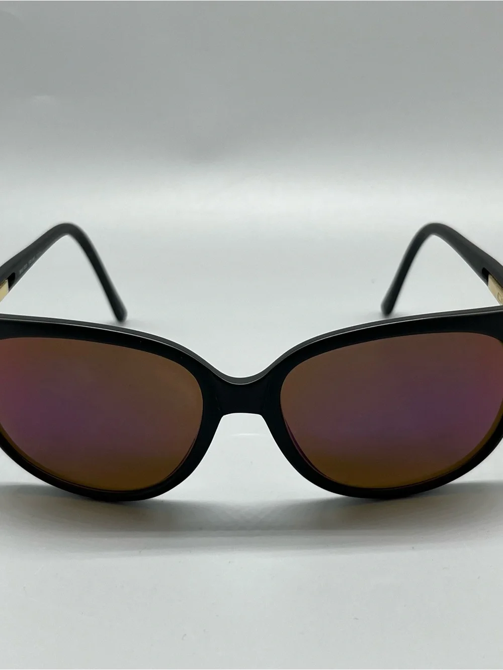 Revo Matte Black Sunglasses with Purple Mirrored Lenses